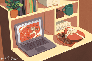 An illustration of a Valentine's Day card on a laptop screen with a box of chocolate hearts next to it.