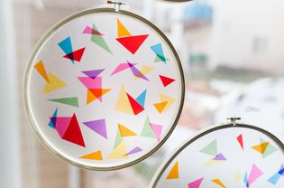 a stained glass suncatcher made with paper and cellophane