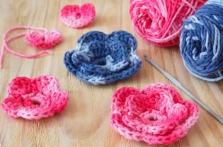 Handmade pink and blue crochet flowers and heart
